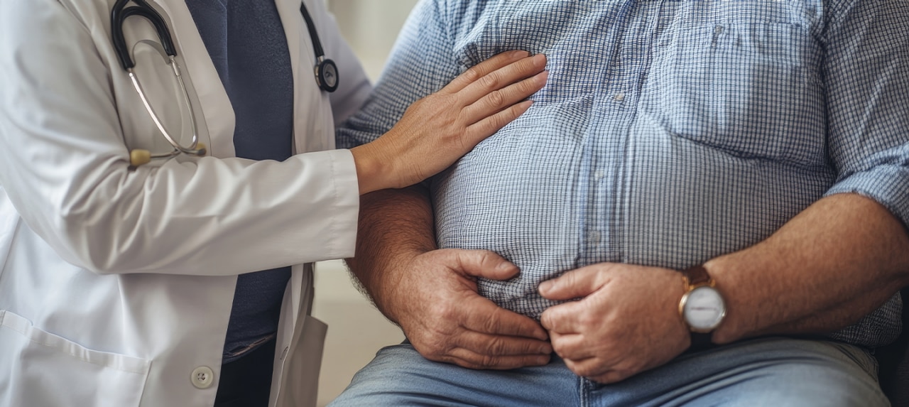 Obese man at hernia consultation
